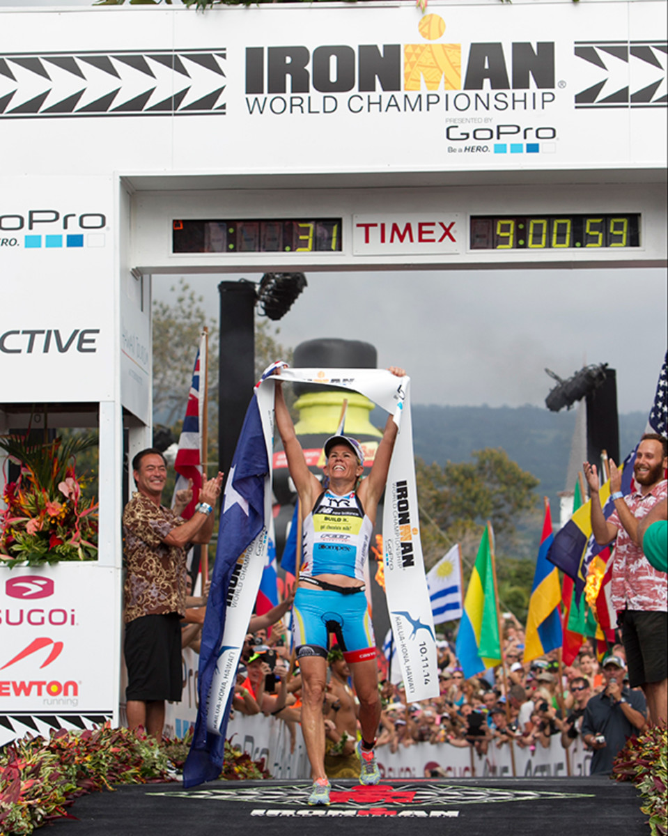 Mirinda Carfrae, of Australia, wins the woman's 2014 IRONMAN World Championship in Kailua Kona, Hawaii. Carfrae overcame the largest deficit in IRONMAN history, winning the race after closing a 14 and a half minute gap between second place finisher Daniela Ryf, of Switzerland.