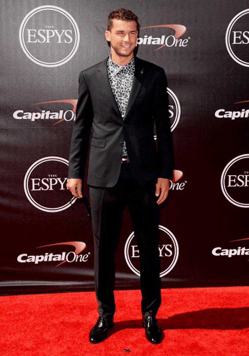 Grigor Dimitrov poses for the cameras on the red carpet.