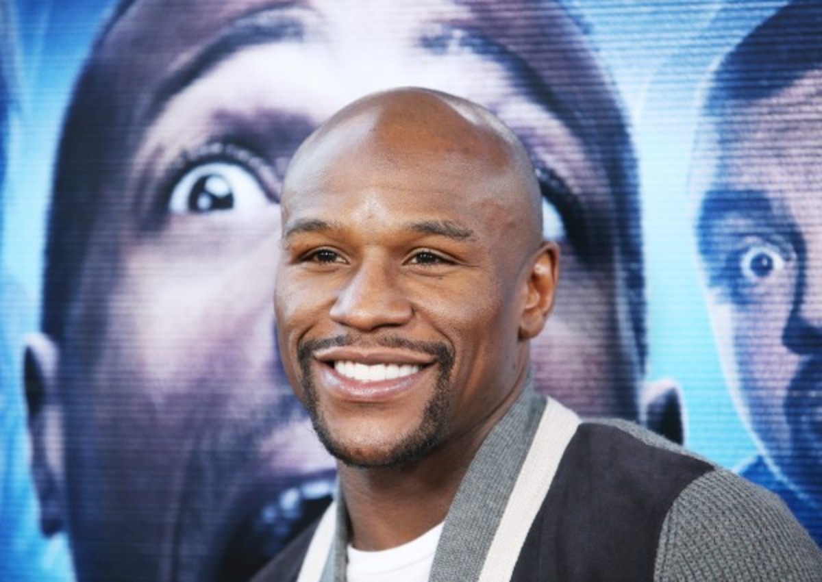 Floyd Mayweather Jr. earned a total of $73.5 million from his two fights in 2013. (Michael Tran/Getty Images)