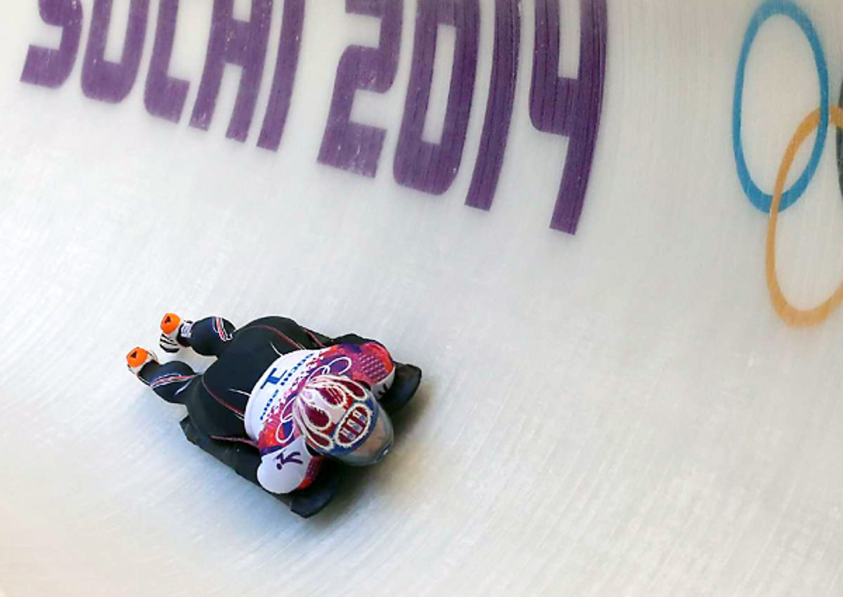 Noelle Pikus-Pace is second midway through the women's skeleton competition, .44 seconds off the lead.
