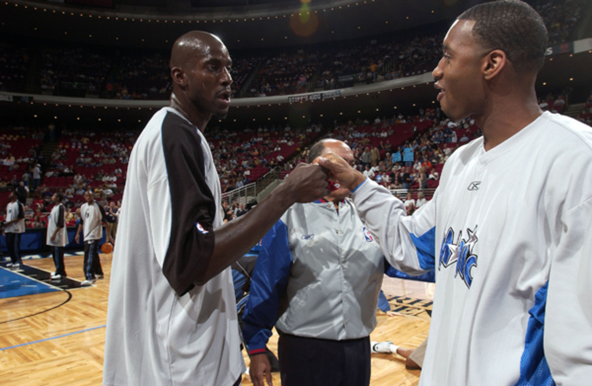 Tracy McGrady and Kevin Garnett :: Getty Images