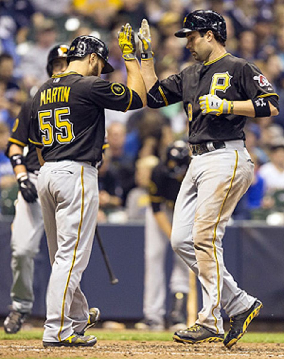 Neil Walker smashed two home runs in a (rain-shortened) slugfest against the Reds.