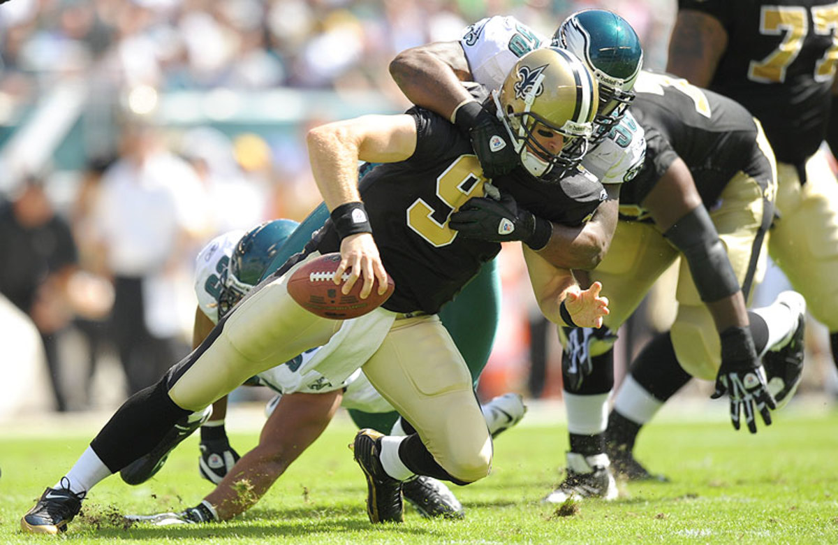 Keeping Drew Brees upright and away from Trent Cole will be vital for the Saints to beat the Eagles on Saturday in Philadelphia. (Drew Hallowell/Getty Images)