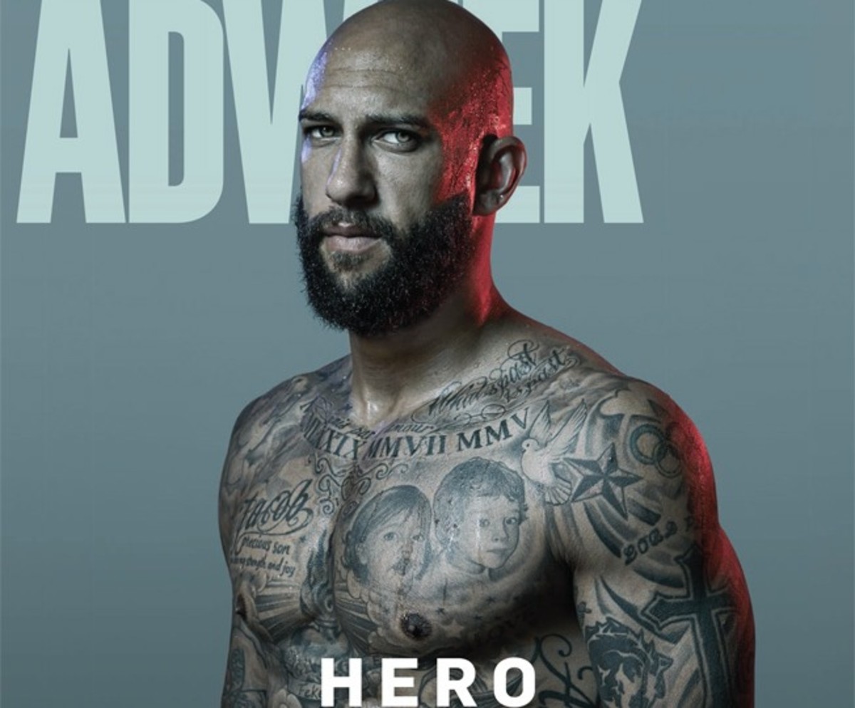 Tim Howard shows off his tattoos on the cover of Adweek.