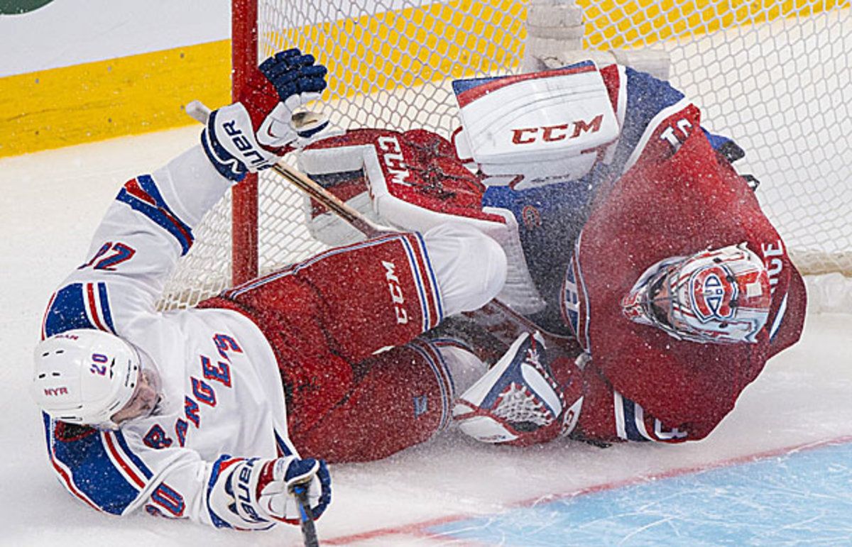 Chris Kreider collides with Carey Price