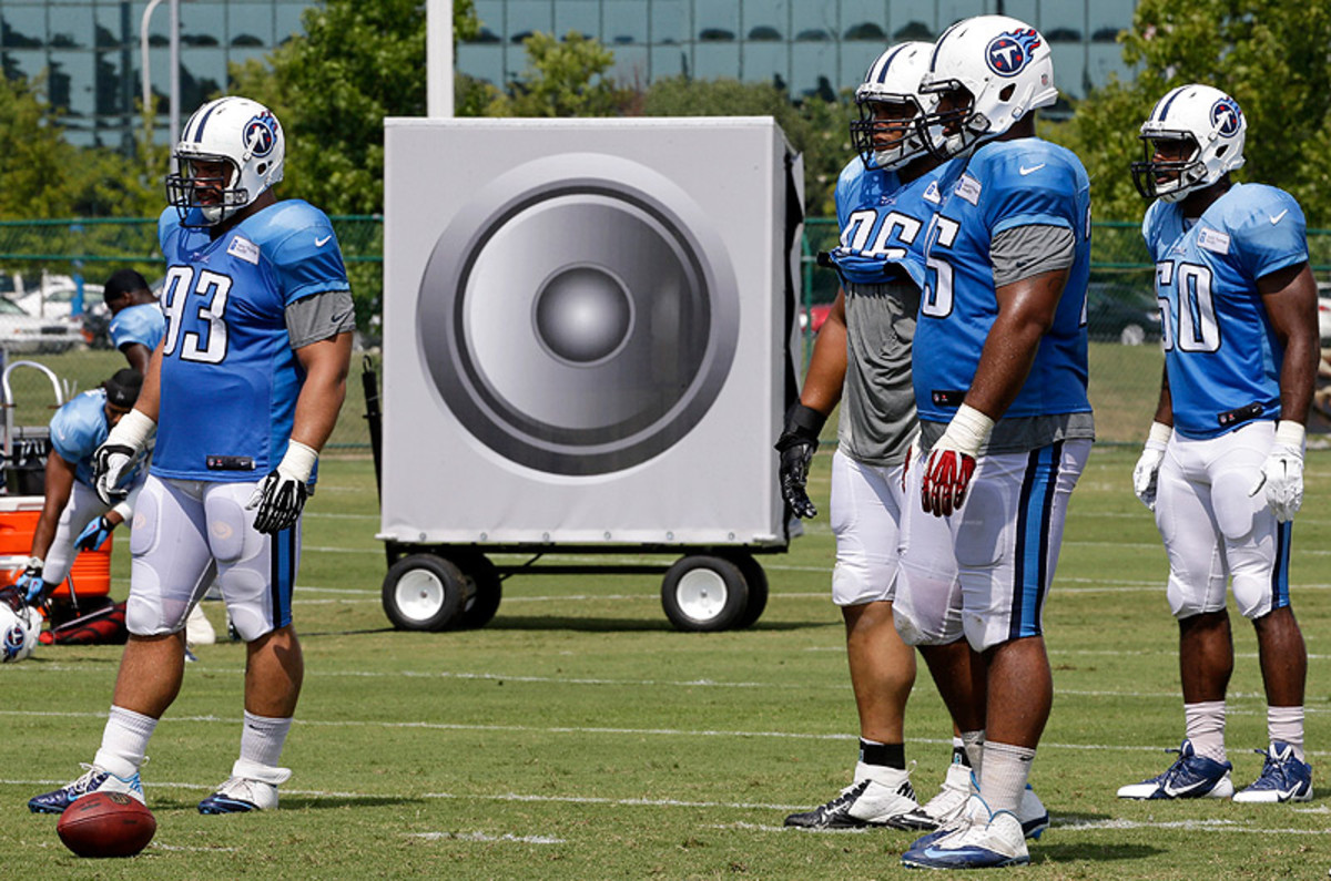 The Titans use speakers to pipe in crowd noise during practices, while other teams choose to play music to keep the mood upbeat. (Mark Humphrey/AP)