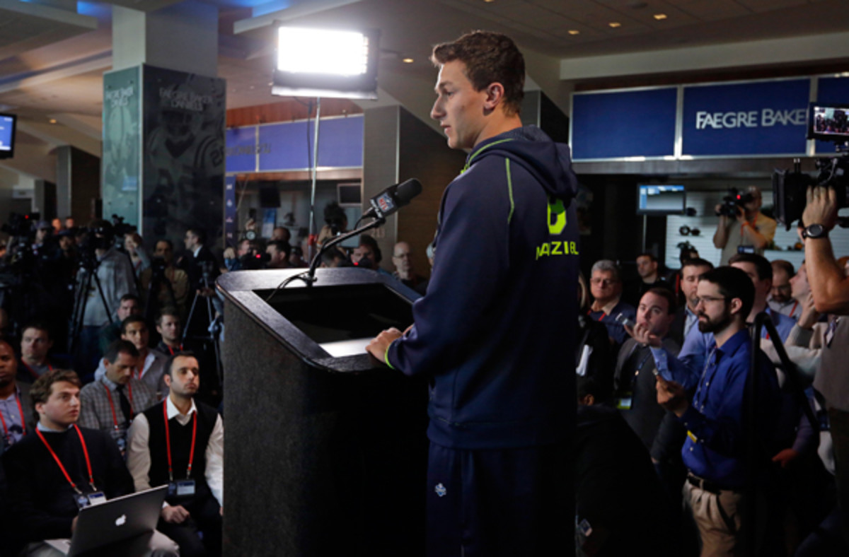 Johnny Manziel at 2014 NFL combine, facing one of his more persistent opponents.