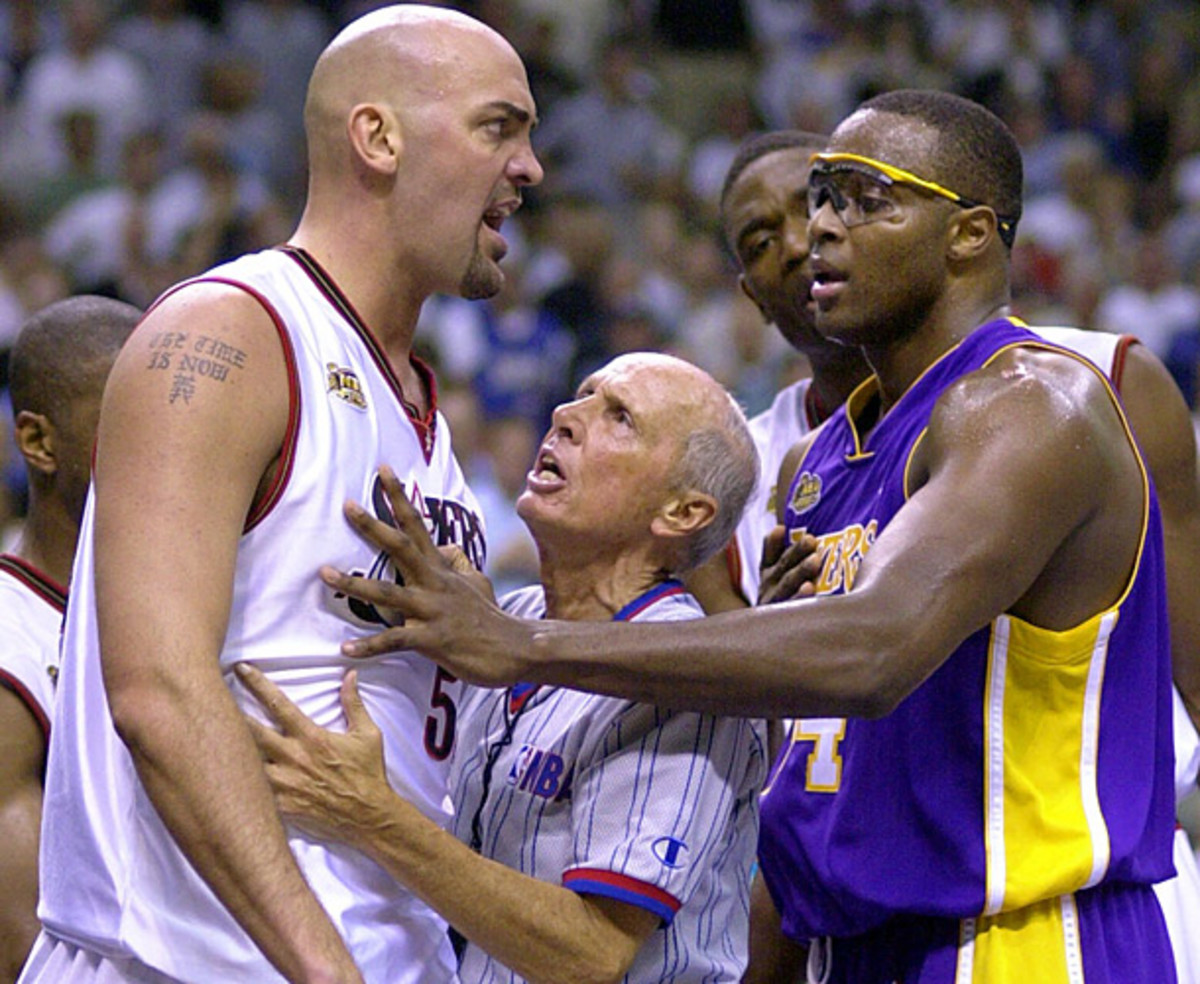 Bavetta tries to calm down an irate Matt Geiger during the 2001 NBA Finals. (AP/Rusty Kennedy)
