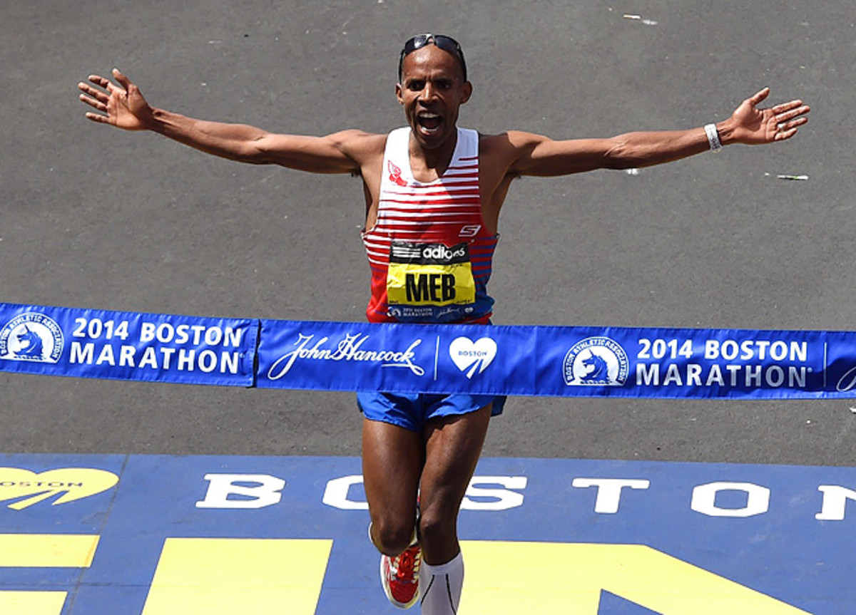 Meb Keflezighi crosses the Boston Marathon finish line 11 seconds ahead of the second-place runner.
