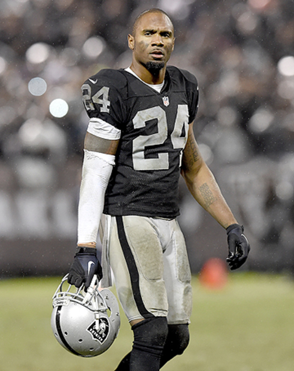 Charles Woodson is playing well enough to earn another contract. (Thearon W. Henderson/Getty Images)