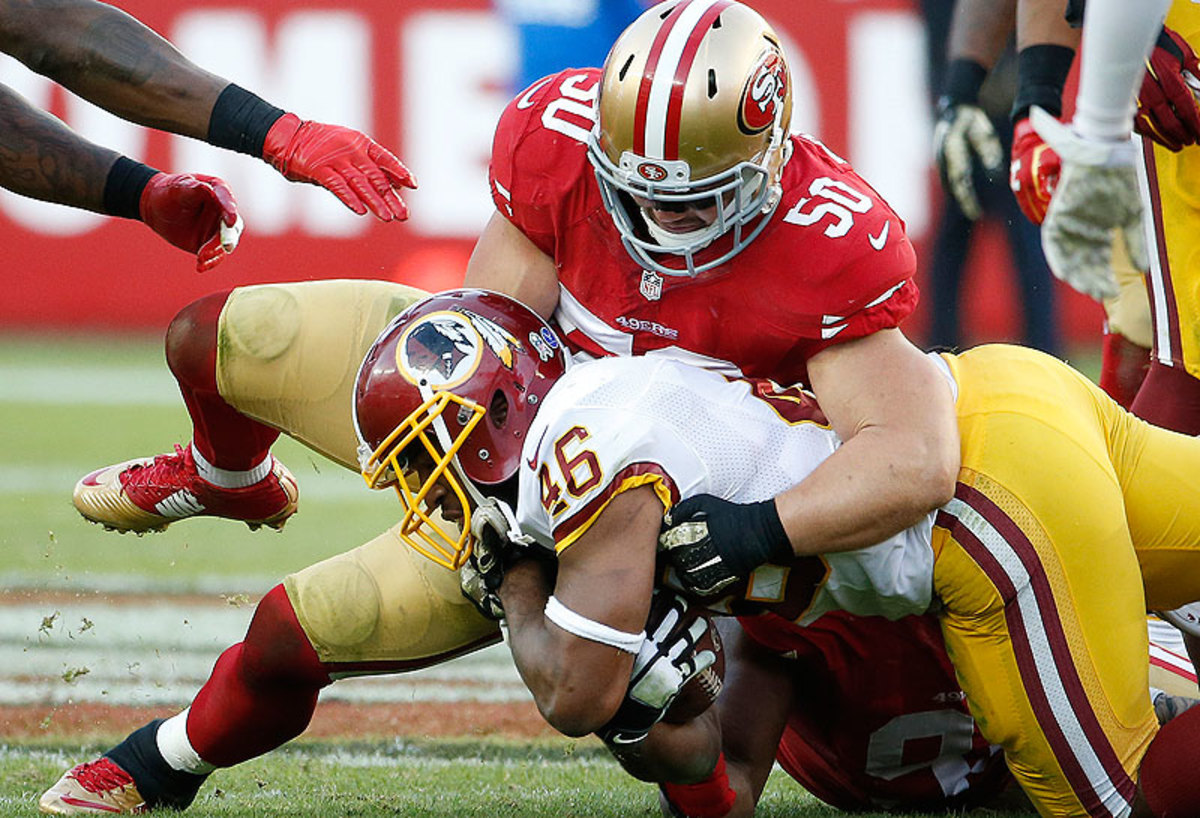 Chris Borland is averaging 12.8 tackles per game since taking over as a starting inside linebacker five weeks ago. (Tony Avelar/AP)