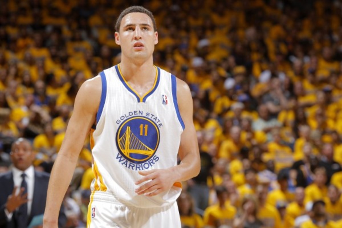 Klay Thompson averaged 18.4 points on 41.7 percent shooting from beyond the arc. (Rocky Widner/Getty Images)