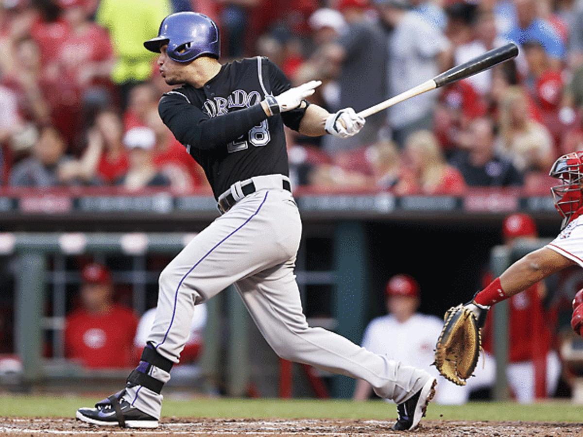 Nolan Arenado's 28-game hitting streak concluded with an 0-3 performance on Friday. (Joe Robbins/Getty Images)