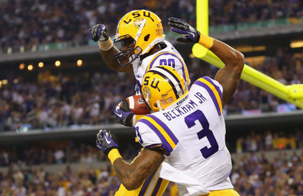 Odell Beckham, Jr. helps teammate Jarvis Landry celebrate a touchdown. 
