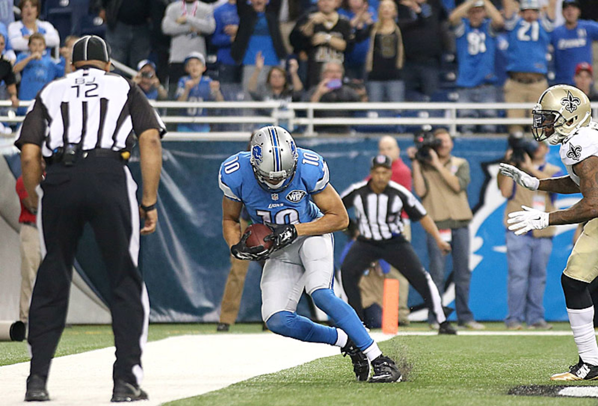 With Calvin Johnson sidelined, it was ex-practice squader Corey Fuller tapping his toes for the game-winning touchdown. (Leon Halip/Getty Images)