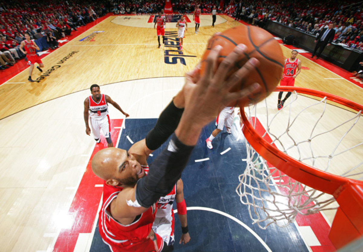 The Bulls plan to have Taj Gibson replace Carlos Boozer in a starting role next season. (Ned Dishman/NBA)