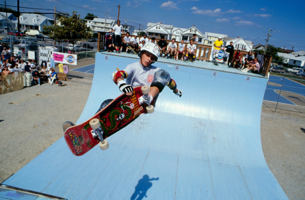 Bucky Lasek, skating for Powell Peralta, does a frontside air above the half pipe during a competition at the Ocean Bowl Skatepark in July 1988 in Ocean City, Maryland.