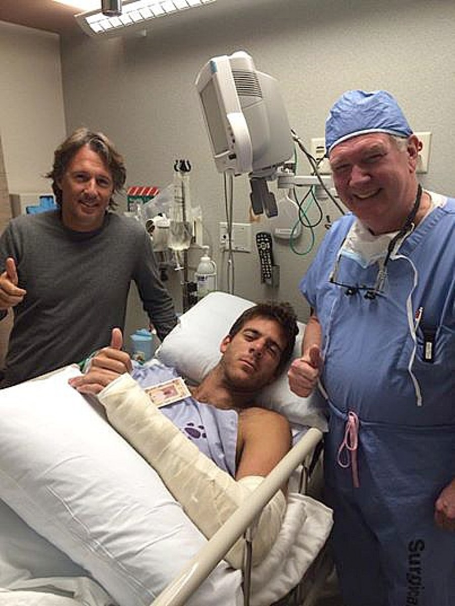 A drowsy Juan Martin del Potro flashes a thumbs up after his wrist surgery. (Facebook)