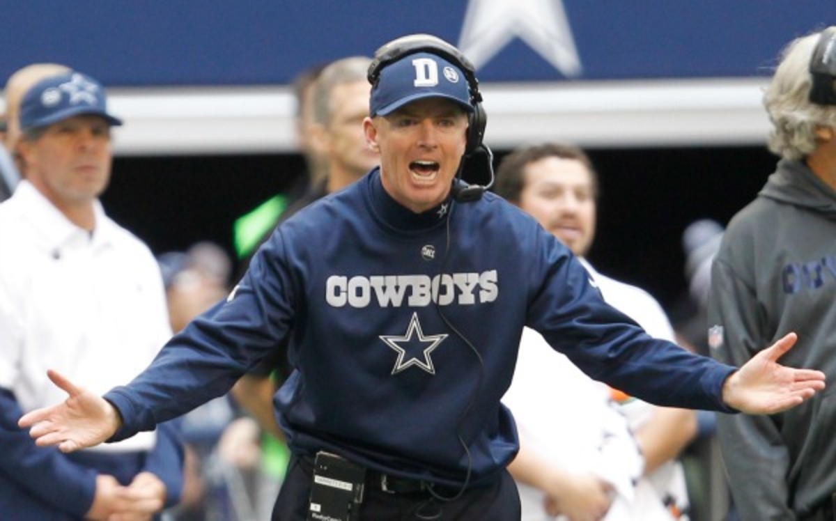 Jason Garrett refused to comment on who will call the Cowboys' plays in 2013. (Getty Images)