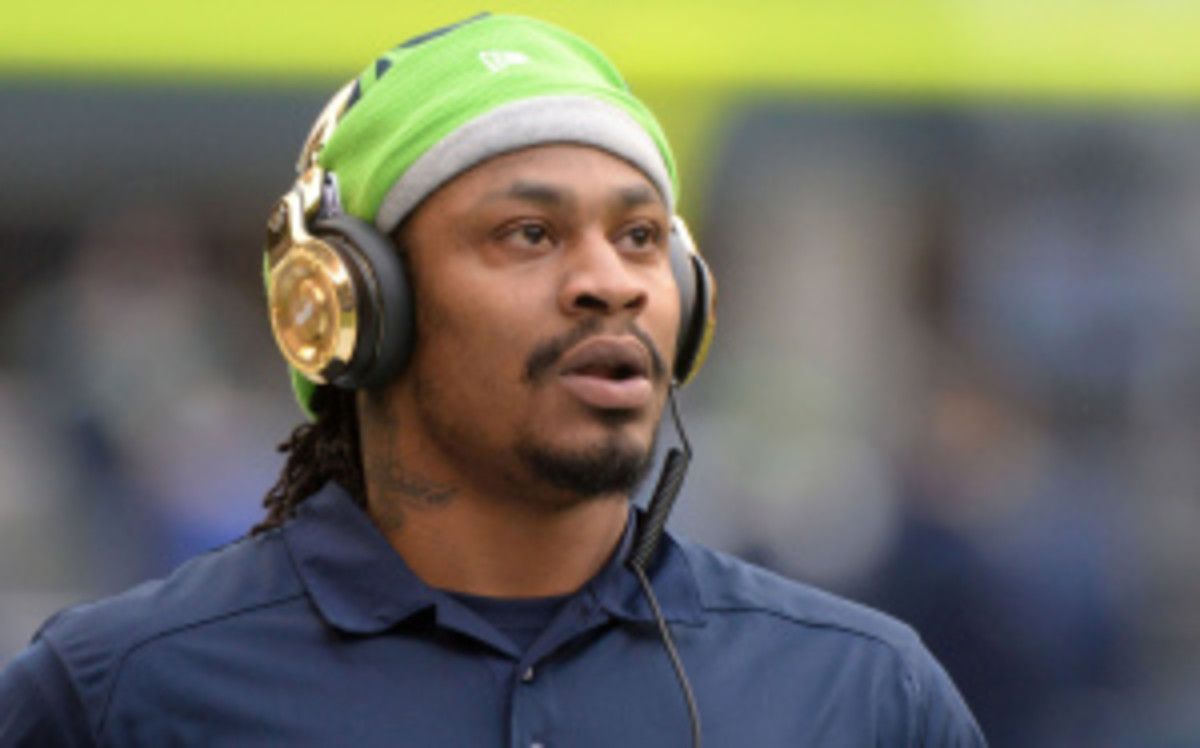This is the second time this season Marshawn Lynch has come under the possible threat of a fine for dodging the media. (Tacoma News Tribune/Getty Images)