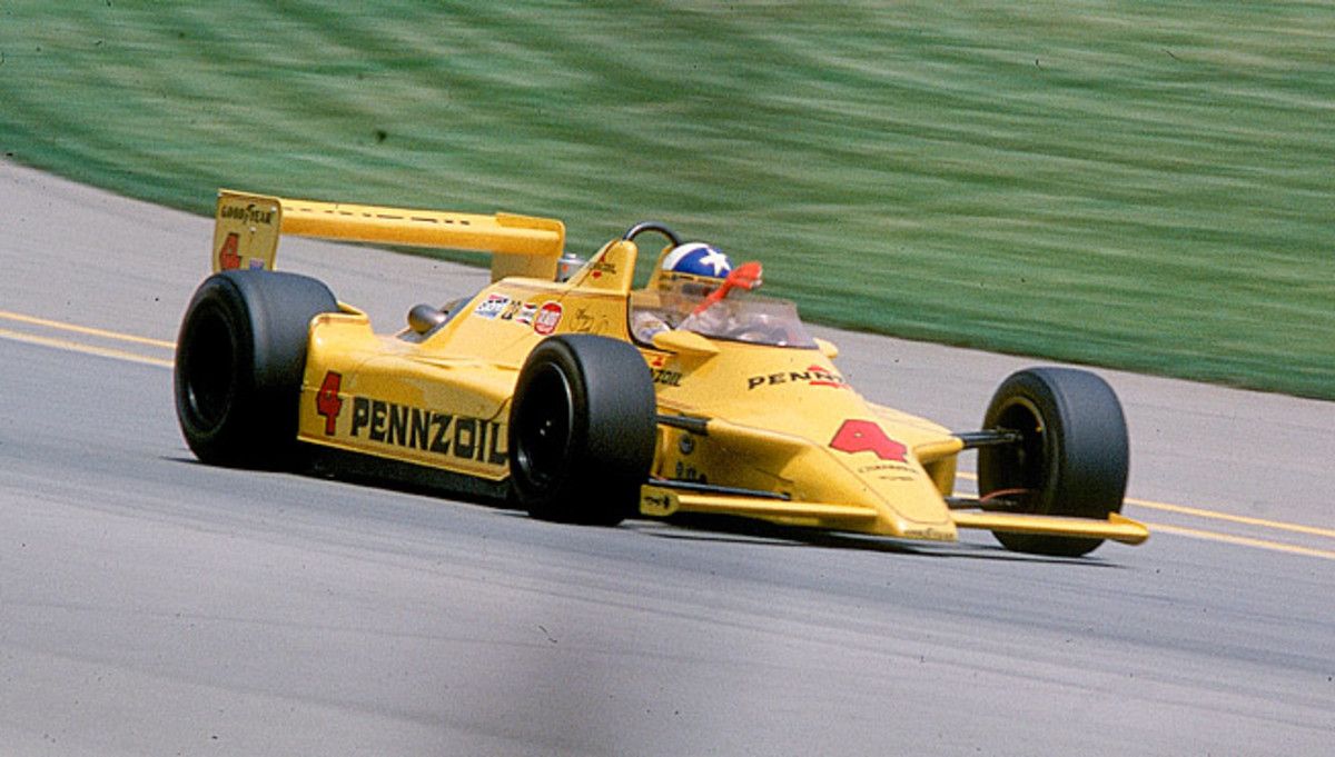 Sky of blue and sea of green, that's Johnny Rutherford in his Yellow Submarine circa 1980.