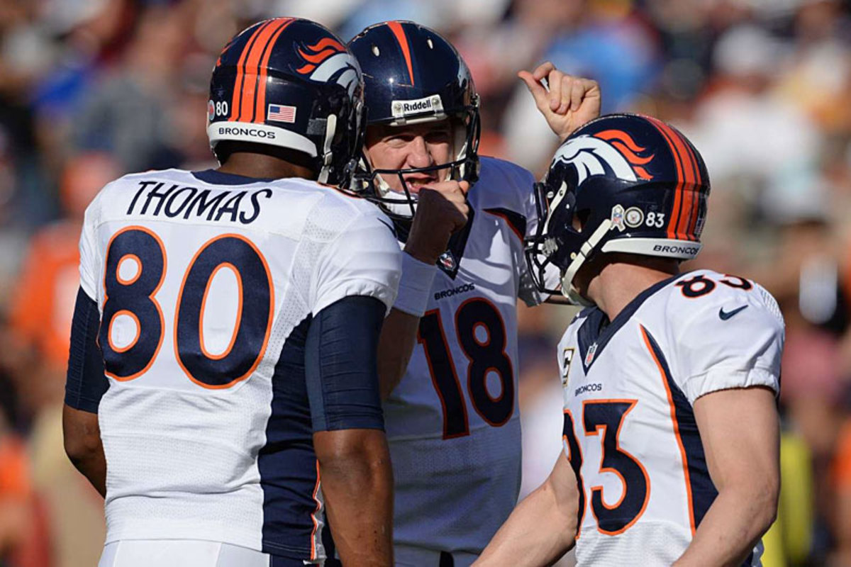 Thomas is still learning the intricacies of the game, and he’s learning from a master in Manning. (John W. McDonough/SI)