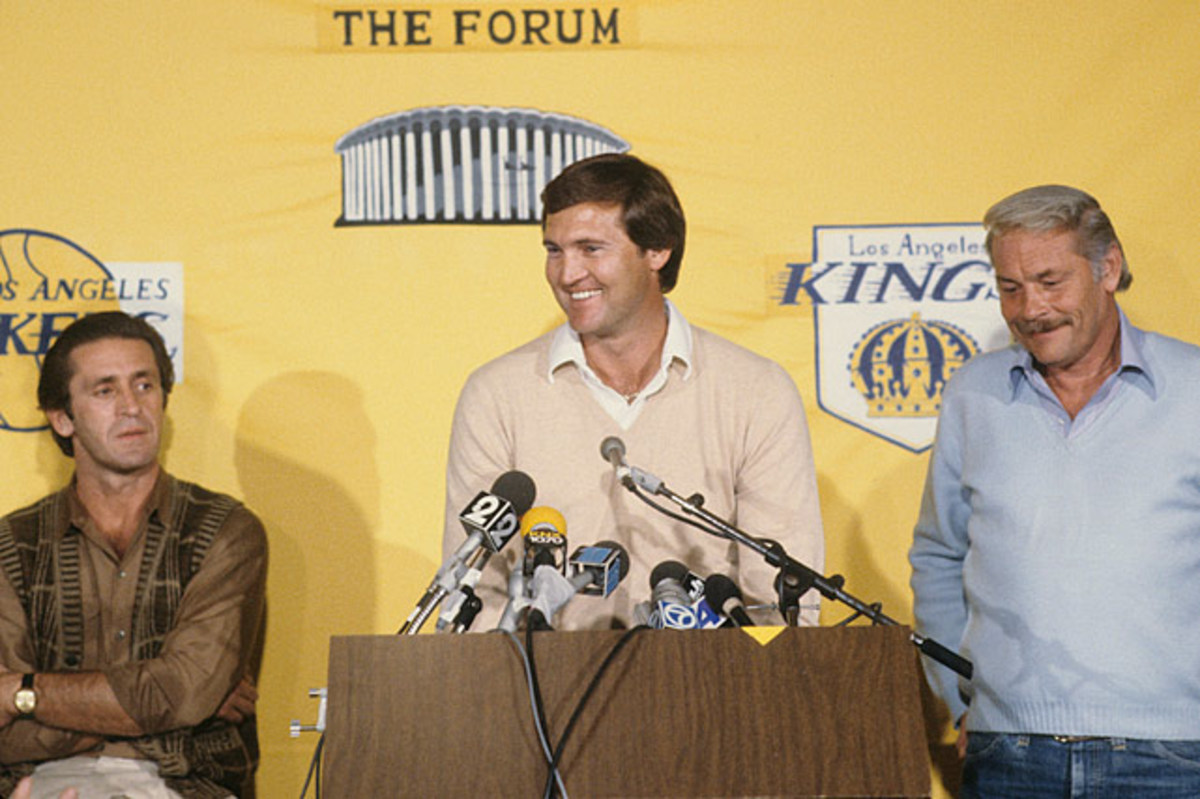 Pat Riley, Jerry West (center) and Jerry Buss (right) during the 1980s.