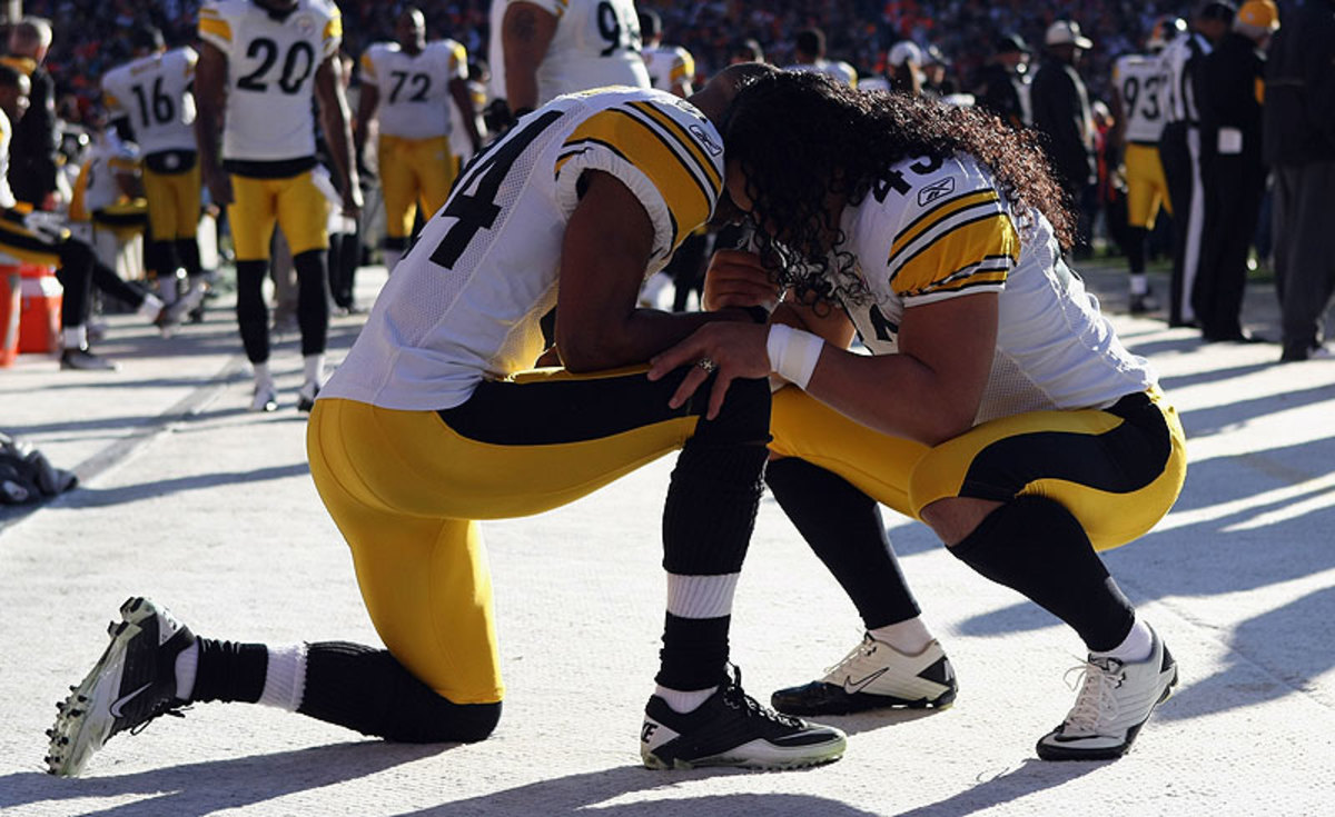 Ike Taylor and Troy Polamalu share a special bond, entering and exiting the NFL in the same years and playing their entire careers for the Steelers. (Jeff Gross/Getty Images)