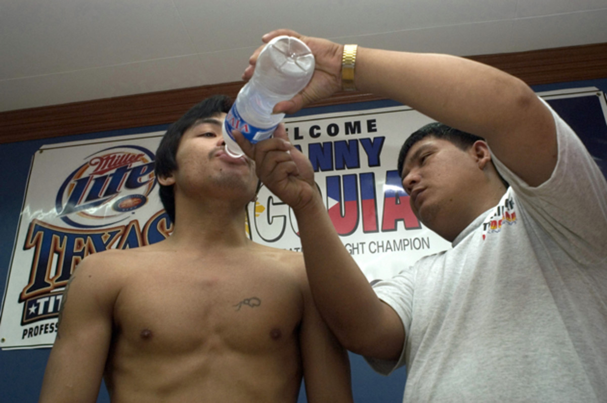 Pacquiao with Fernandez at the Wildcard Gym in Manila in 2004.