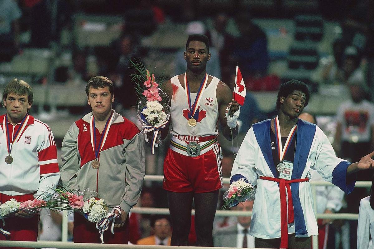 1988-1002-Lennox-Lewis-Riddick-Bowe-001311513.jpg