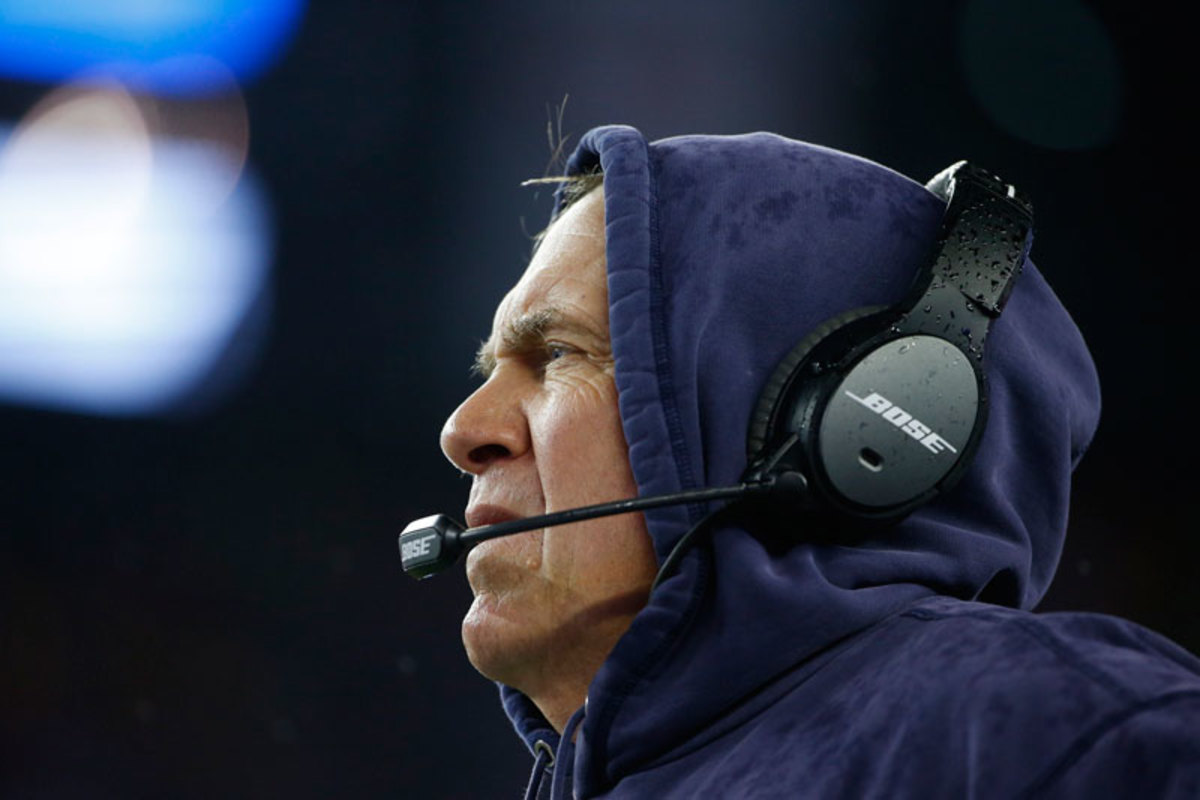 On Thursday, Bill Belichick denied any knowledge of underinflated footballs. (Winslow Townson/SI/The MMQB)
