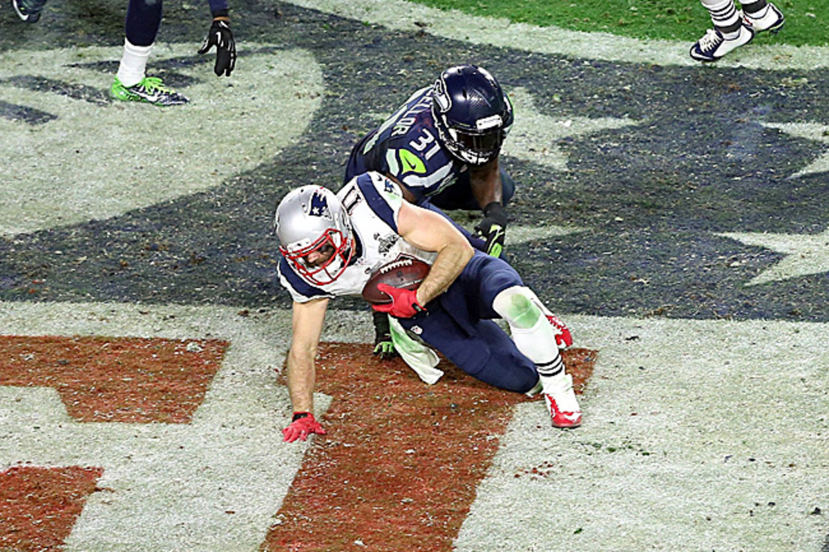 With medical timeouts coming into effect this season, Edelman likely could have been examined after sustaining this hit from Kam Chancellor in the Super Bowl. (Chris Coduto/Icon Sportswire)