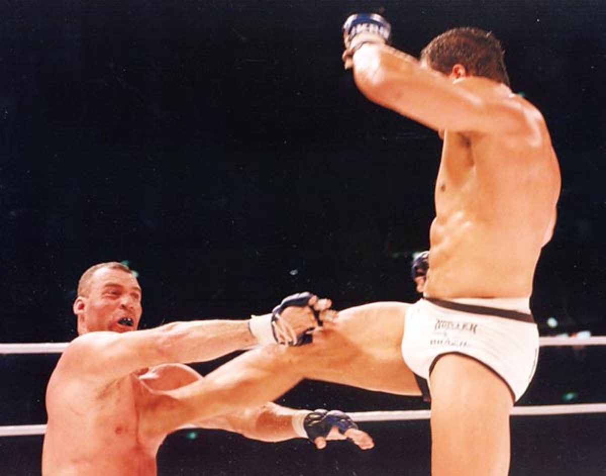 Mark Kerr kicks Hugo Duarte at Pride 4 in Tokyo, Japan, Oct. 11, 1998.