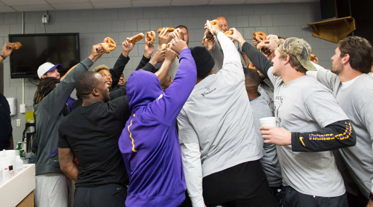 The ceremonial toasting of the donuts.