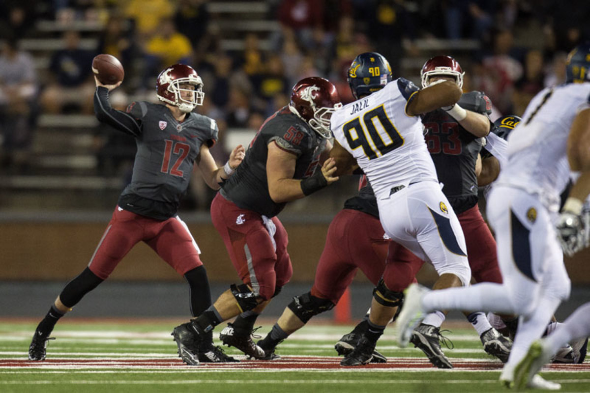 Halliday threw for an NCAA-record 736 yards in a 60-59 loss to Cal on Oct. 4. (Dean Hare/AP)