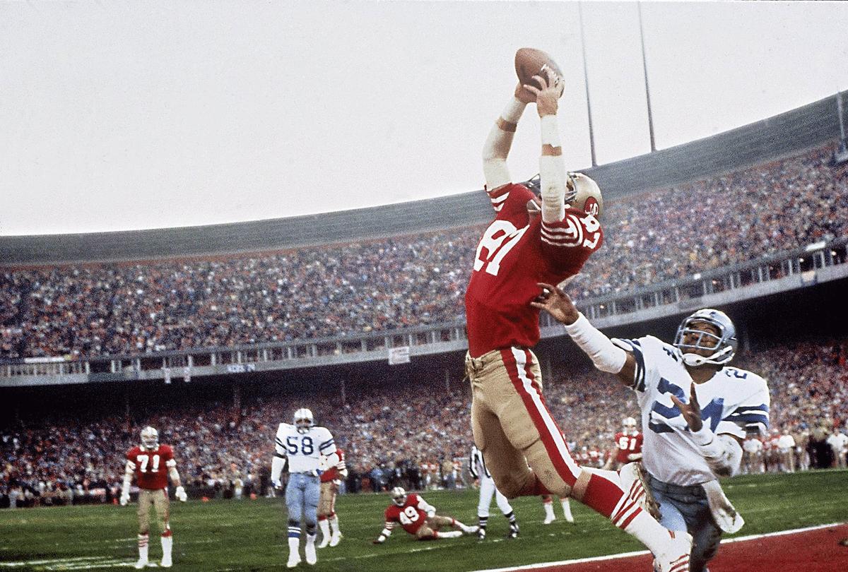49ers receiver Dwight Clark leaps high to make "The Catch" that tied the game late in the fourth quarter.