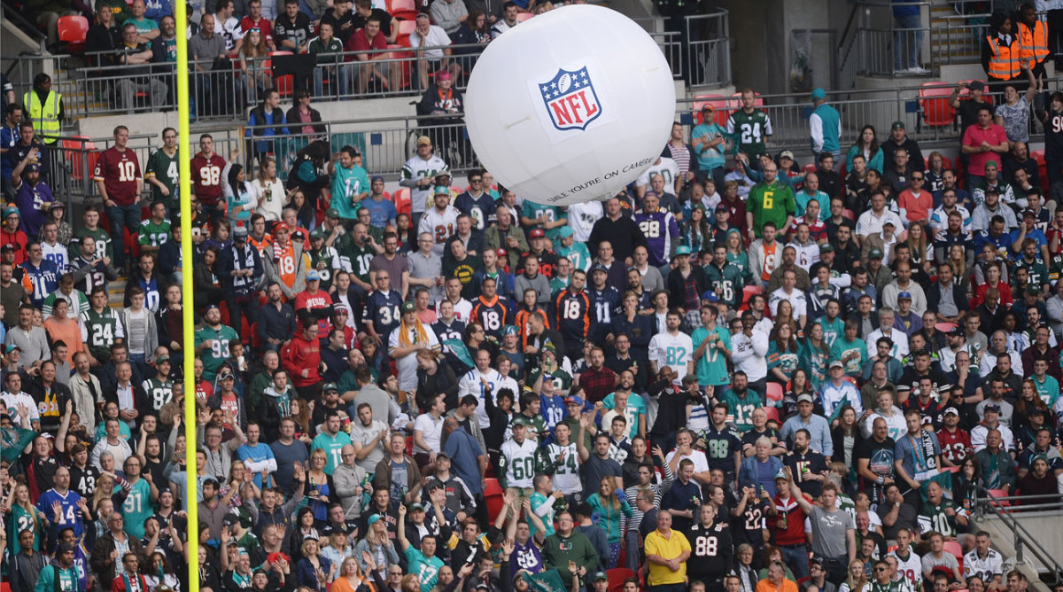 How many different NFL team jerseys can you spot in this London crowd? (Dave J. Hogan/Getty Images)