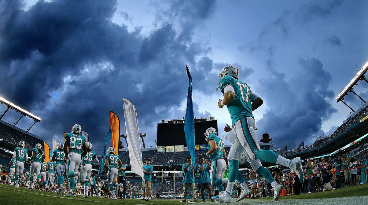 These are dark days for the Dolphins. Are brighter ones ahead? (Mike Ehrmann/Getty Images)