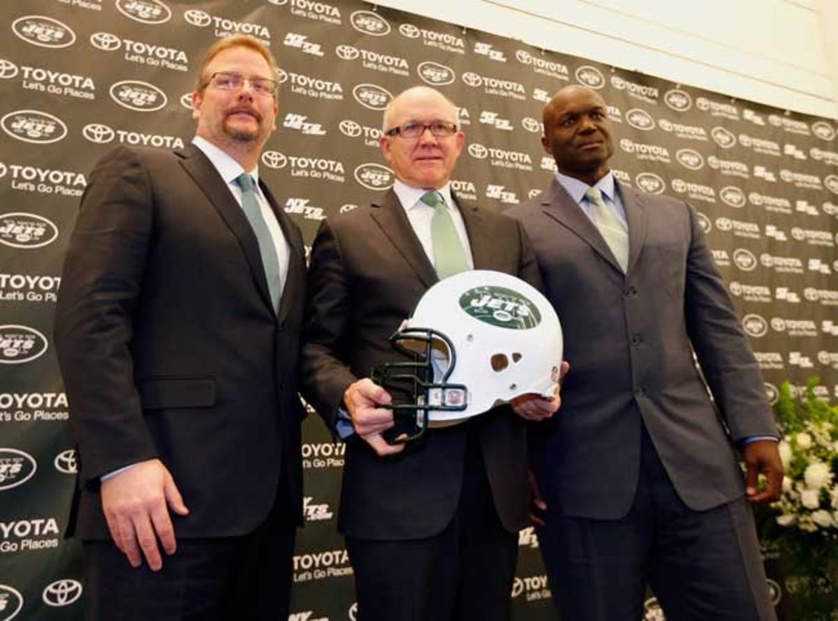 From l. to r., Jets general manager Mike Maccagnan, owner Woody Johnson and Todd Bowles at the coach’s introductory press conference in January.