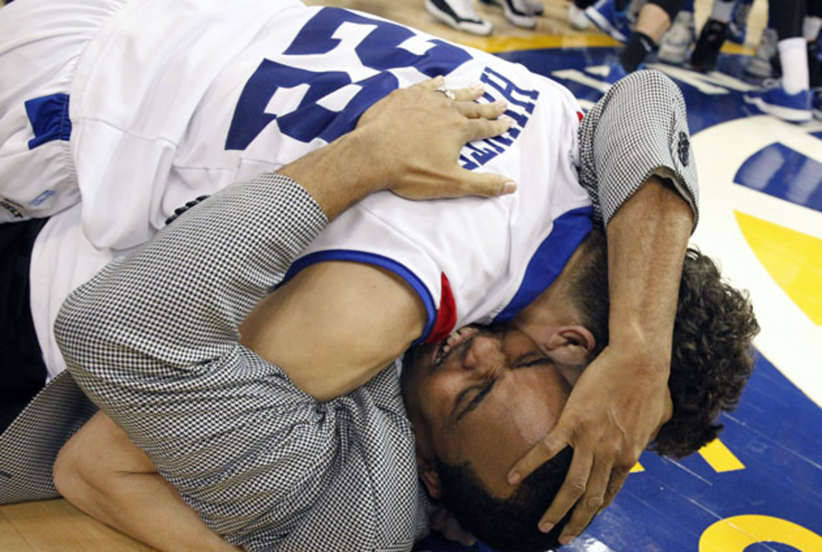 R.J. Hunter and his father, Panthers coach Ron Hunter, embraced after winning the Sun Belt tournament.