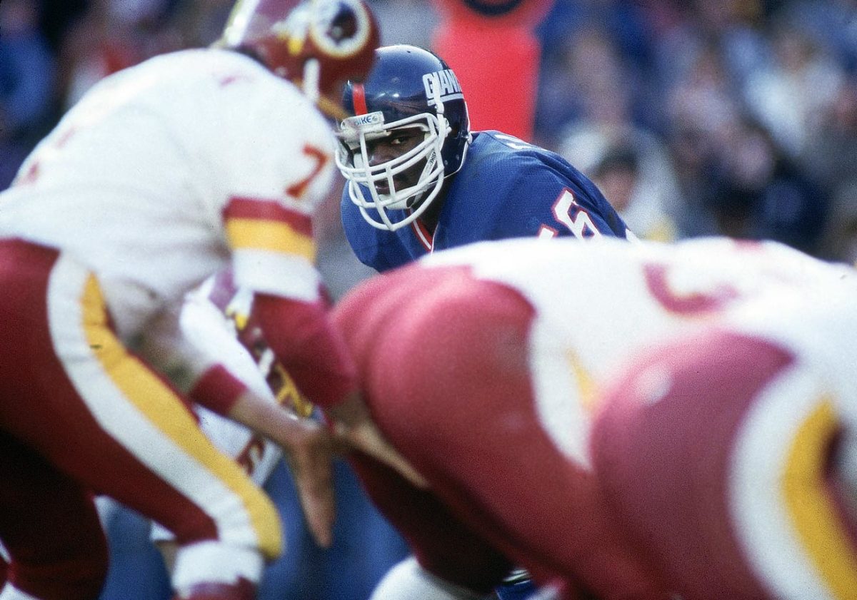 1983-1218-Lawrence-Taylor-Joe-Theismann-079002059.jpg