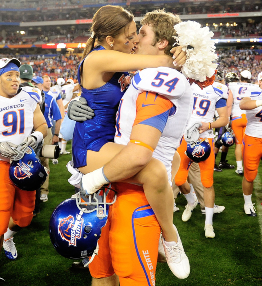 Cheerleaders making out