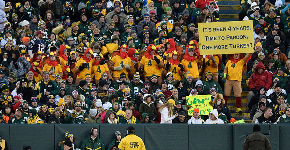 Eventually, some Packers fans forgave Favre for playing for the rival Vikings, as this sign showed at a November 2014 game at Lambeau Field. (Brian D. Kersey/Getty Images)