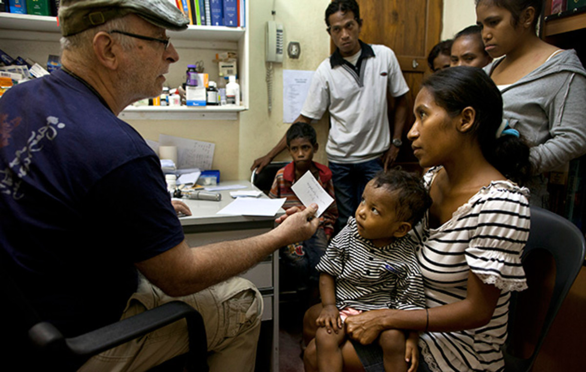 In his medical work, Murphy has almost exclusively sought out underserved people. Here he is in 2012 seeing patients in East Timor.