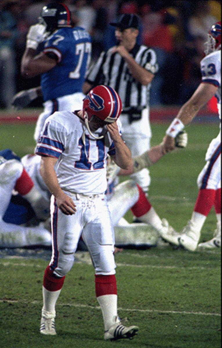 Bills kicker Scott Norwood walks dejectedly off the field after missing would have been the game-winning field goal.