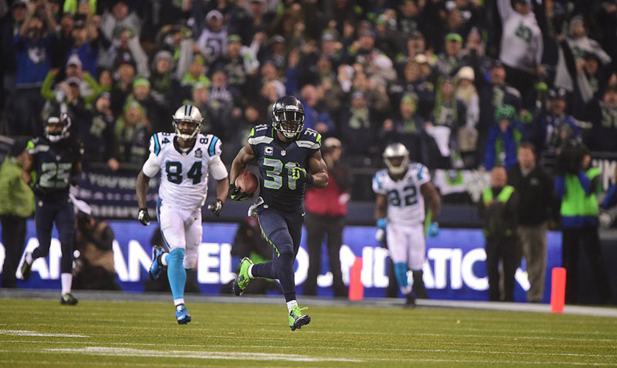 Kam Chancellor's 90-yard interception return for a touchdown is the longest play in Seattle's playoff history. (Robert Beck/Sports Illustrated/The MMQB)
