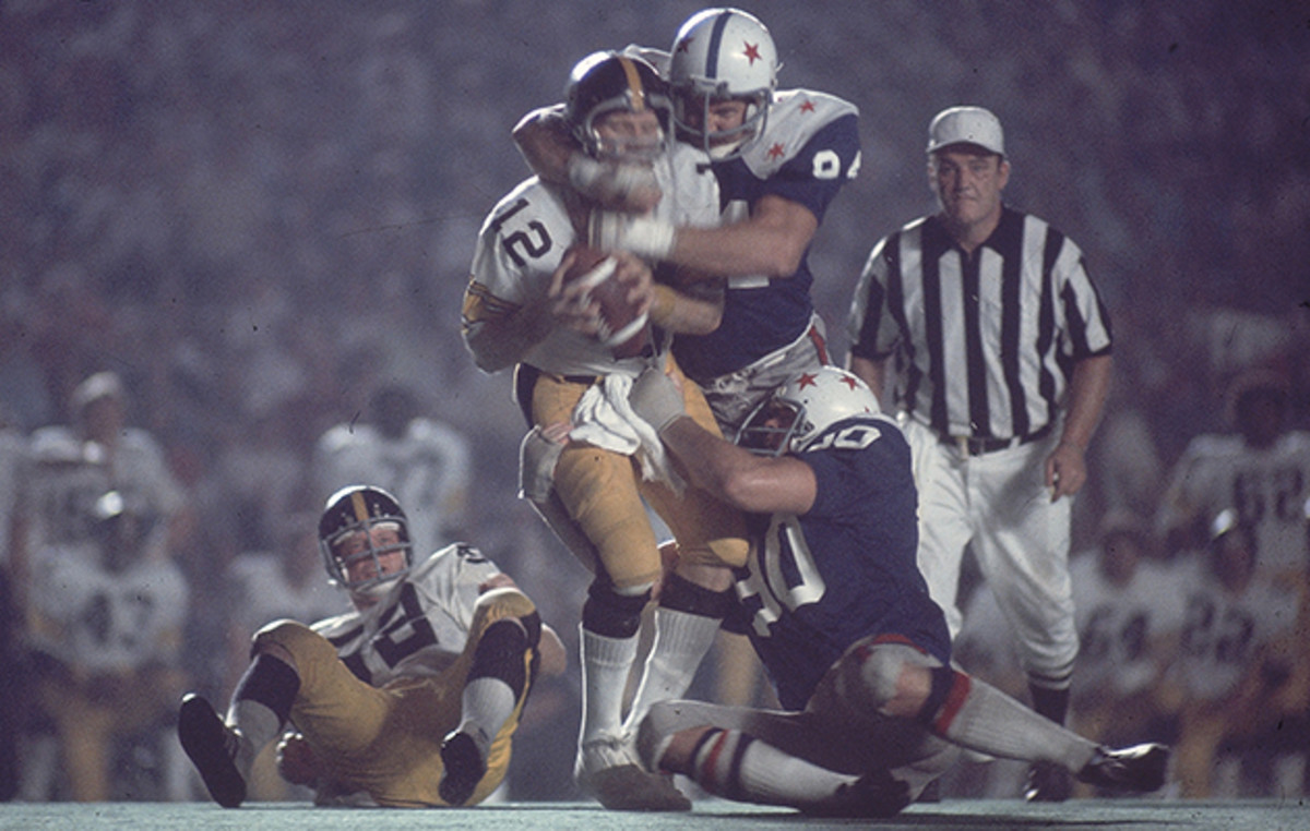 Randy White sacks Steelers QB Terry Bradshaw in the 1975 College All-Star game.