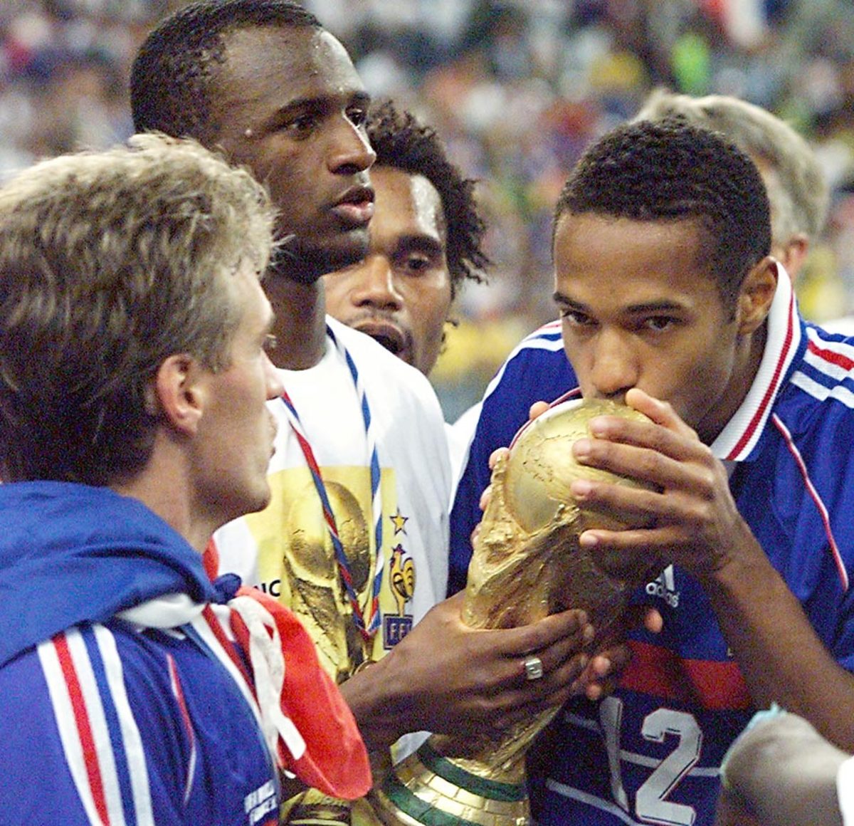 1998-thierry-henry-kissing-trophy.jpg