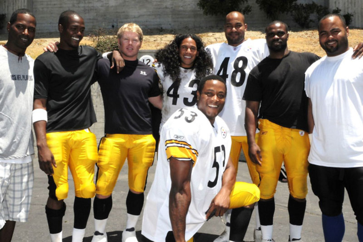 One of these men is a Steeler: Mazio Royster, Sandy Fletcher, Sunny Byrd, Troy Polamalu, Omar Nazel, Gerald Washington, Sulton McCullough and Lee Webb, on the set of a Head & Shoulders shoot. (Courtesy Sunny Byrd)