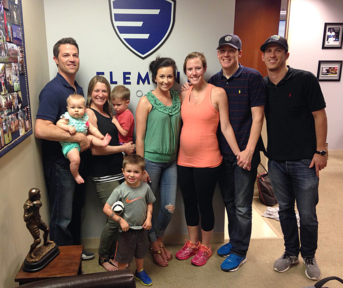 Element Sports Group, from left to right: Michael and Jenifer Perrett and their three kids, Jaclyn DeBacco, Kevin and Madelyn McGuire, Alex Goldenberg. (Robert Klemko/The MMQB)